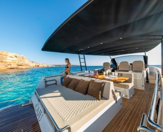 woman enjoying mega yacht in Ibiza