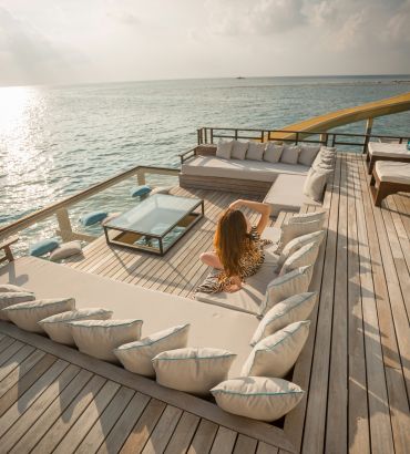 woman sunbathing in a mega yacht